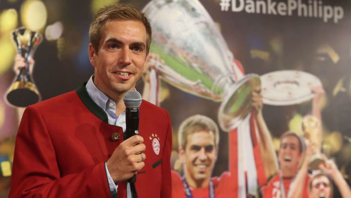Philipp Lahm Hands Over Championship Trophy To FCB Erlebniswelt